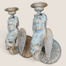 Load image into Gallery viewer, Ziebarth's Antiques pair of distressed white cast iron cherub wall sconces with ornate wing and circular mount details.