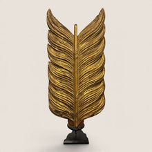 Load image into Gallery viewer, Ziebarth's Antiques golden carved feather sculpture with intricate texture on a minimalist black display stand.
