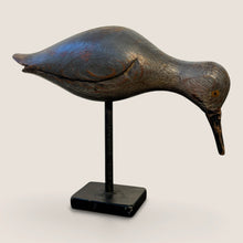 Load image into Gallery viewer, Ziebarth's Antiques hand carved wooden shorebird decoy with a weathered dark finish on a black metal stand.