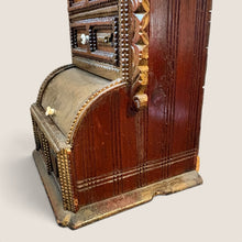 Load image into Gallery viewer, Ziebarth's Antiques dark wood apothecary chest with intricate chip-carved details, roll-top compartment, and white knobs.