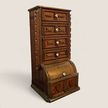 Load image into Gallery viewer, Ziebarth's Antiques dark wood apothecary chest with chip-carved details, white ceramic knobs, and heart motifs.