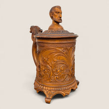 Load image into Gallery viewer, Ziebarth's Antiques hand-carved wooden beer stein with intricate floral relief, scrollwork, and a sculpted bust finial.