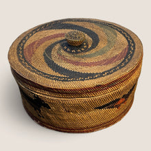 Load image into Gallery viewer, Ziebarth's Antiques handwoven lidded basket with earthy brown, ochre, and black geometric and animal motifs.