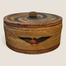 Load image into Gallery viewer, Ziebarth's Antiques handwoven round lidded basket with earthy brown, ochre, and black bird motifs in natural fibers.