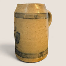 Load image into Gallery viewer, Ziebarth's Antiques salt-glazed stoneware beer mug in beige with cobalt blue floral motifs and horizontal banding.