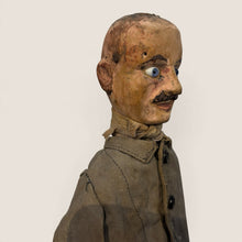 Load image into Gallery viewer, Ziebarth's Antiques vintage handcrafted wooden puppet with blue glass eyes, painted mustache, and weathered fabric coat.