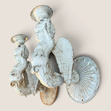 Load image into Gallery viewer, Ziebarth's Antiques pair of distressed white cast iron cherub wall sconces with ornate wing and circular mount details.