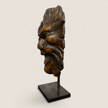 Load image into Gallery viewer, Ziebarth's Antiques hand-carved wooden Green Man mask sculpture on a minimalist black metal stand, side profile view.
