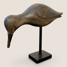 Load image into Gallery viewer, Ziebarth's Antiques hand-carved wooden shorebird decoy with a weathered dark finish on a black metal stand.