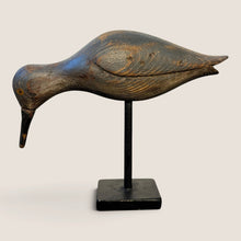 Load image into Gallery viewer, Ziebarth's Antiques hand-carved wooden shorebird decoy sculpture with a weathered dark finish on a black metal stand.
